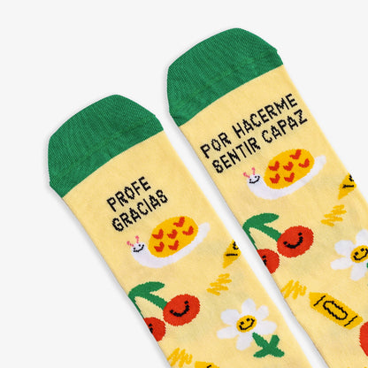 Kit Taza + Calcetines "Profe, gracias por hacerme sentir capaz"
