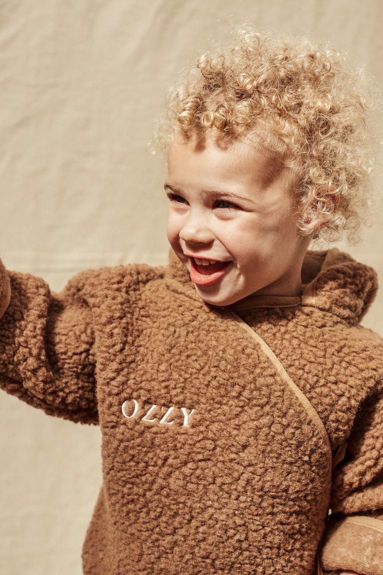 MILK MERINO SNUGGLESUIT