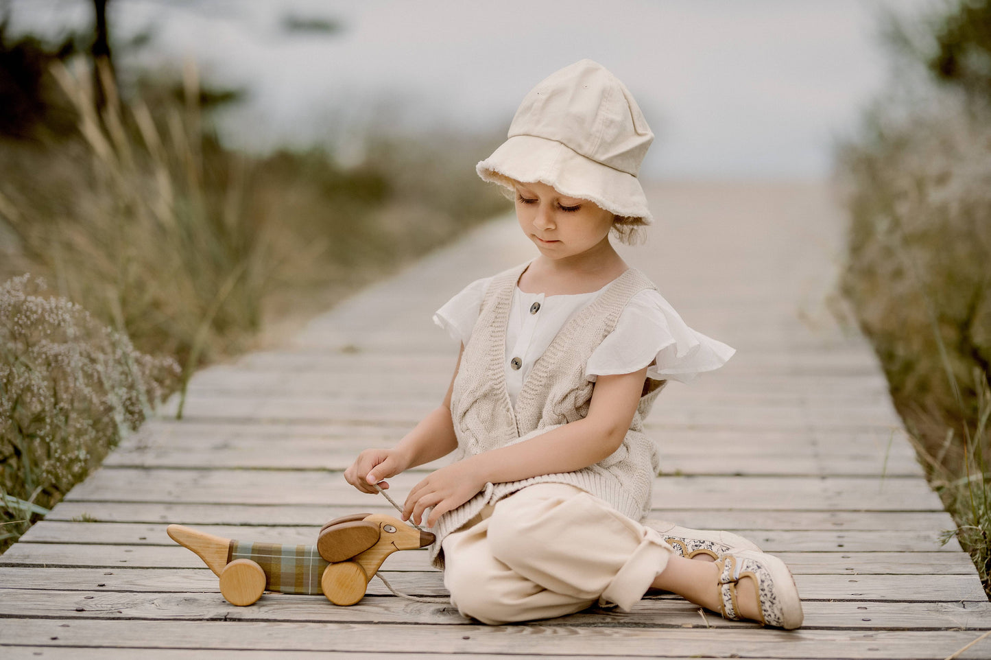 Handcrafted Birch Wood Green Sausage Dog Pull Toy