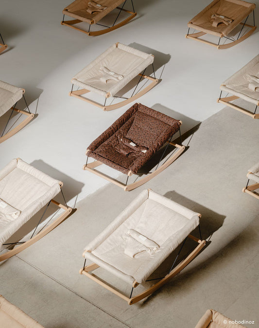 Growing Green baby bouncer - leonie brown