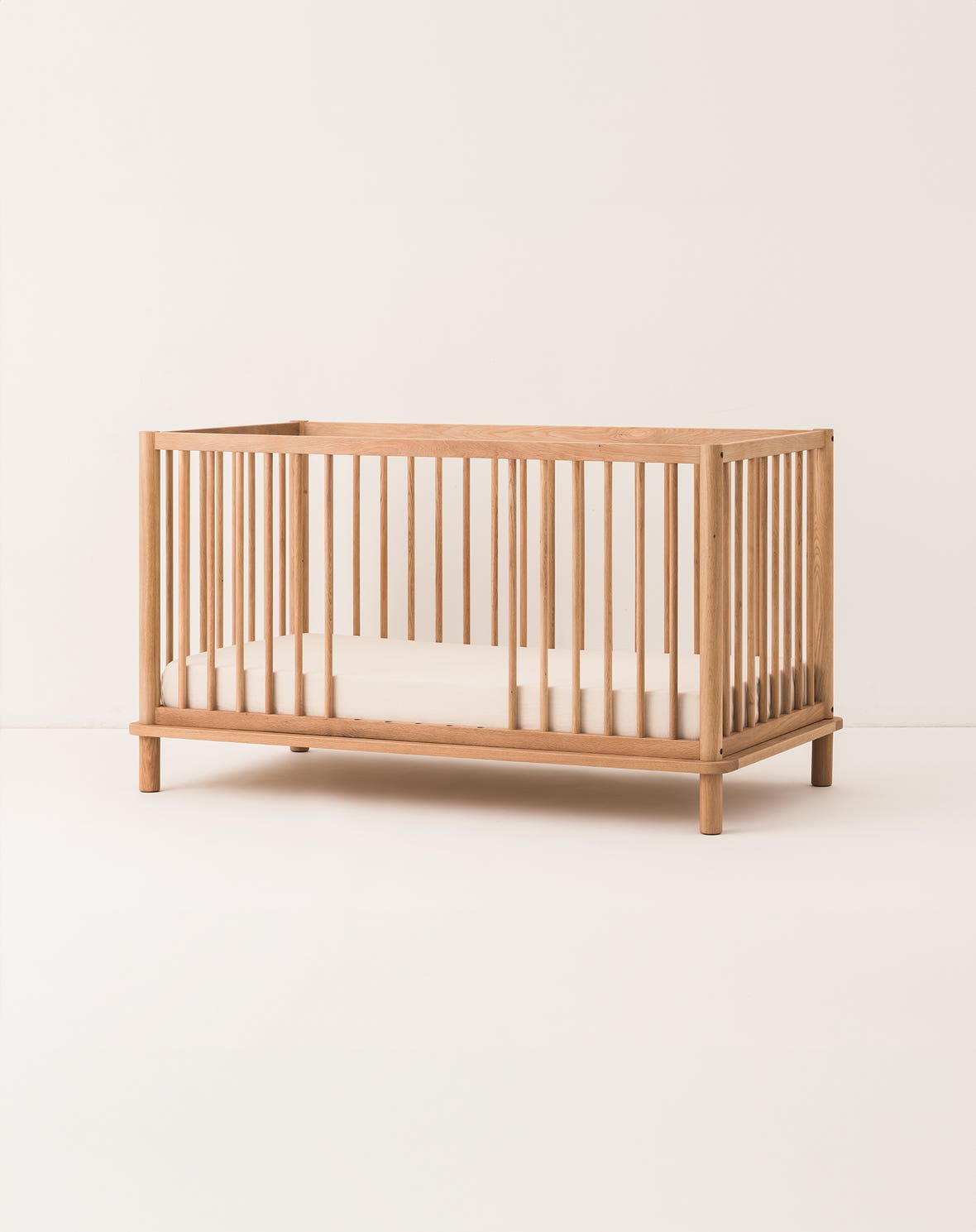 Latitude evolving crib + junior bed extension set - solid oak