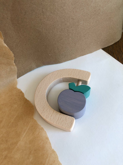 Plum fruit rattle