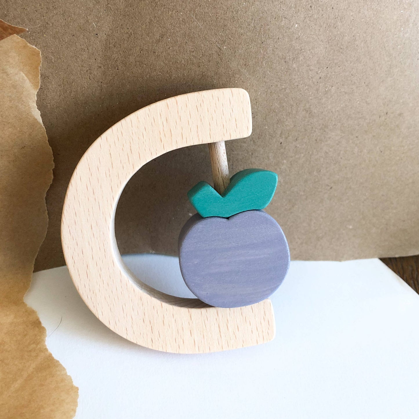 Plum fruit rattle