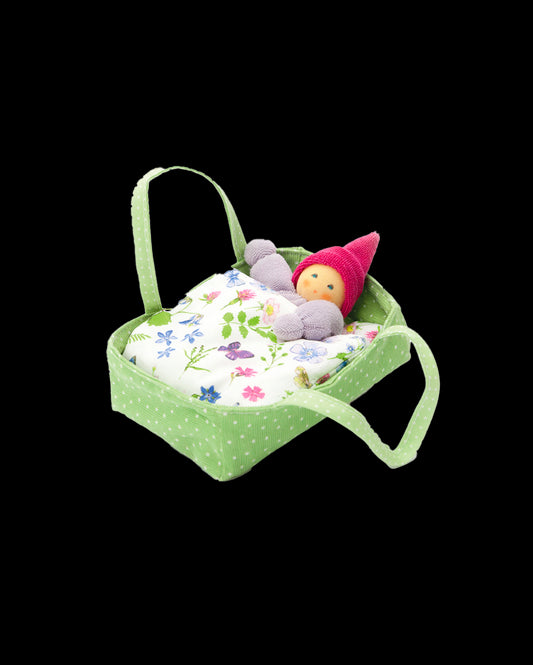 Gnome in the flower bed green